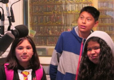 Bayview students in front of microphone at KZSC FM radio station